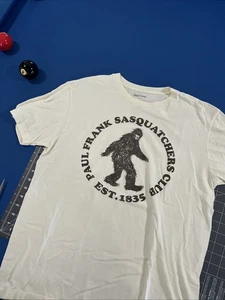 Camiseta Paul Frank Hombre L Crema/Marrón Saquatchers Club Logo Squatch Y2K - Imagen 1 de 6