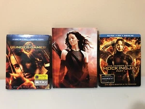 The Hunger Games: First 3 Movie Lot Catching Fire Mockingjay Part I Blu Ray DVD - Picture 1 of 10