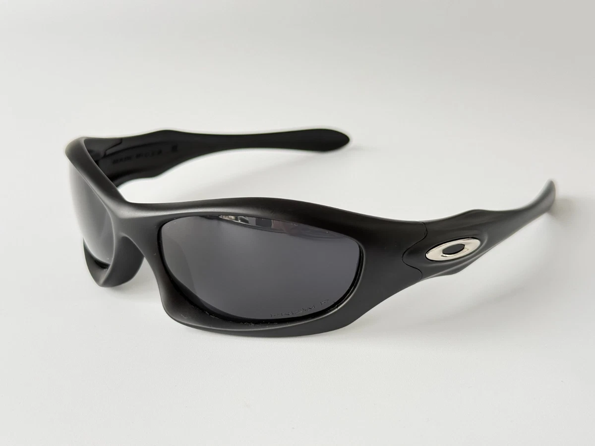 Preços baixos em Óculos de Sol Polarizado Oakley Monster Dog para