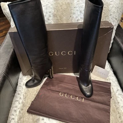 古驰黑色皮革小牛高筒靴金色镶嵌 36 码二手带盒 — 第 1/4 张图片