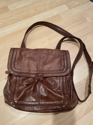 Borsa zaino a tracolla convertibile The Sak Ventura in pelle invecchiata marrone teak