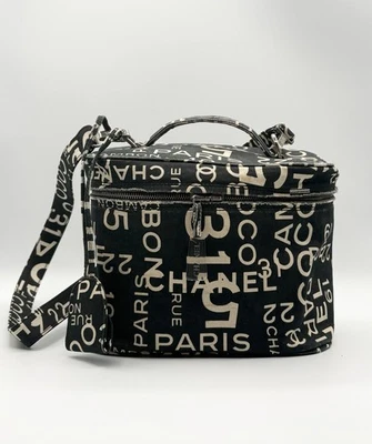 Estuche tocador Chanel 31 Rue Cambon Paris lona blanco y negro 2 vías vintage Y2K Foto 1 de 4