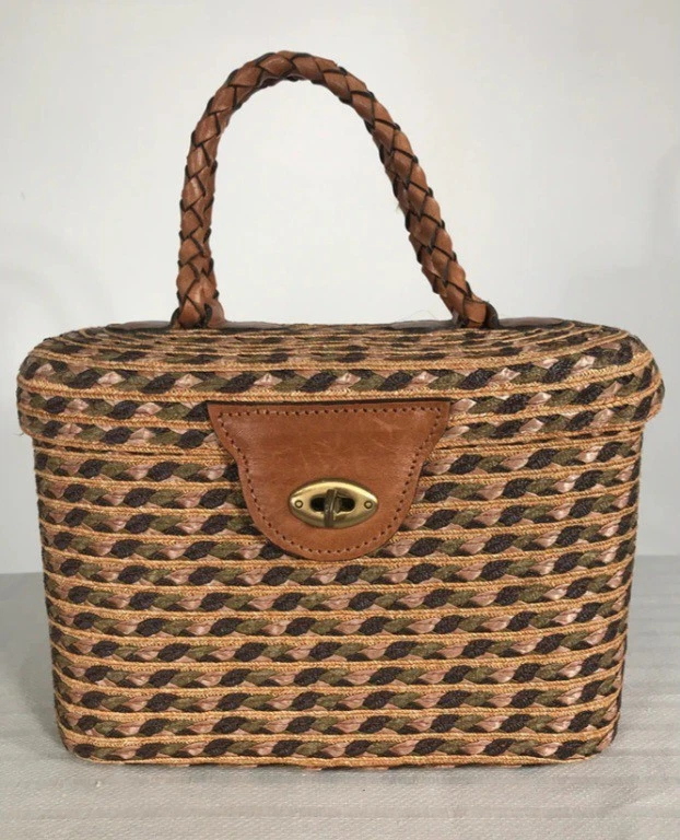 De colección. Bolso de mano 'Eric Javits' tejido, cordón de rafia y cuero Foto 1 de 4