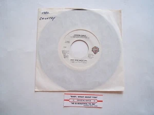CRYSTAL GAYLE - Baby What About You / He Is Beautiful - 45 RPM 7" Record 1982 WB - Picture 1 of 7