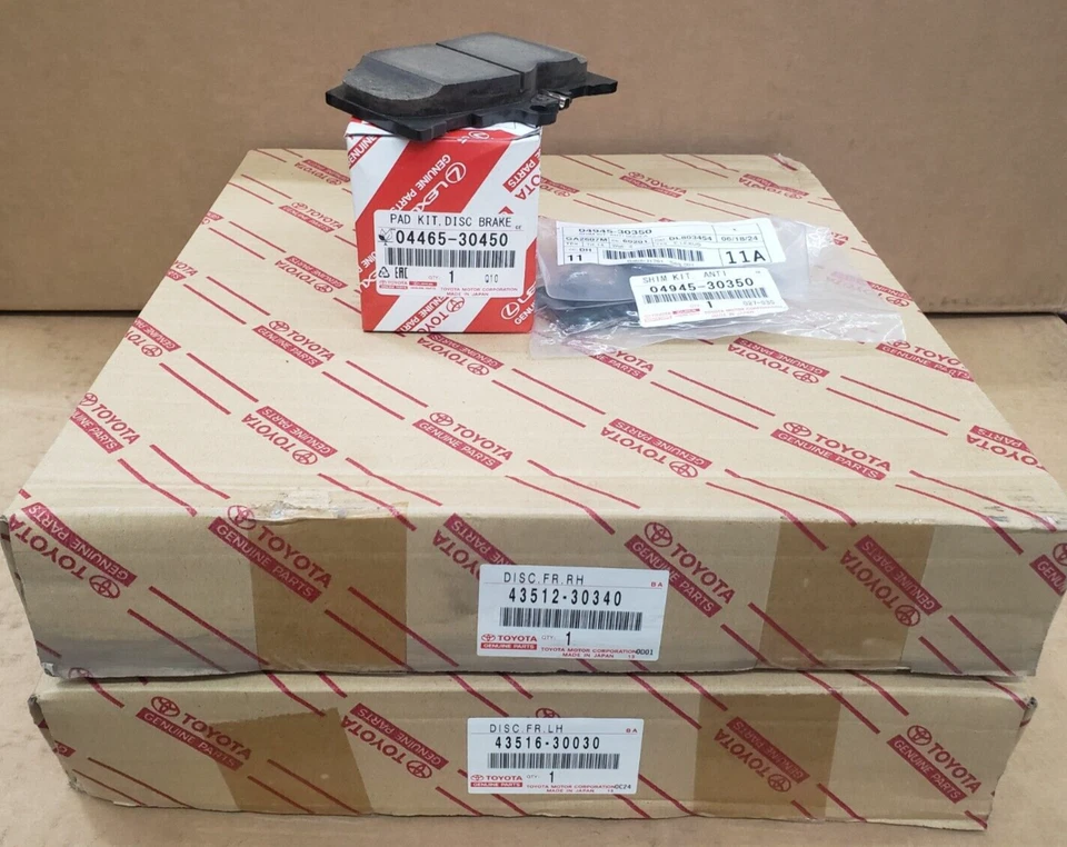 LEXUS OEM FACTORY DIRECTIONAL FRONT ROTORS / PADS AND SHIMS SET 2009-2010 IS350 - Image 1 of 1