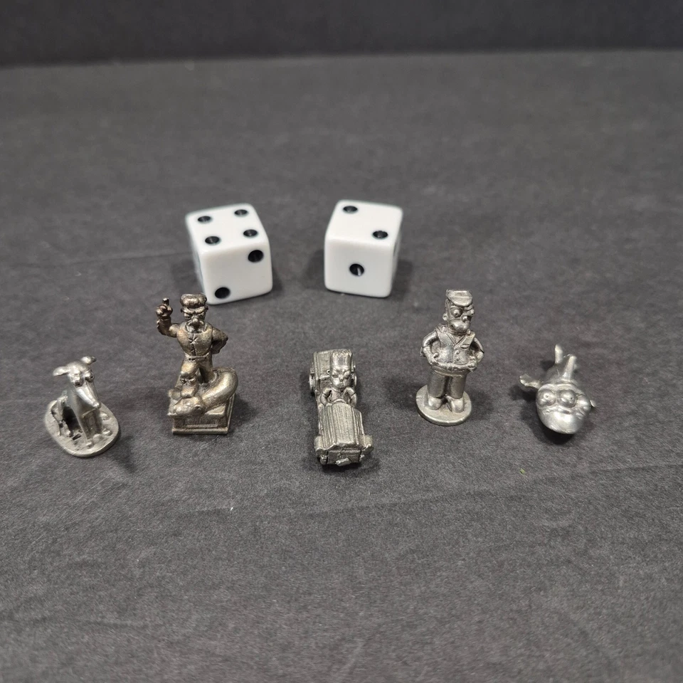 Piezas de repuesto para juegos MONOPOLY THE SIMPSONS - 5 fichas y dados solamente Foto 1 de 4