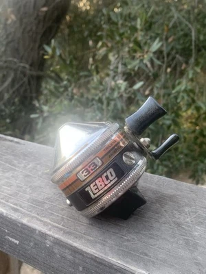 Carrete de pesca ZEBCO modelo 33 Spincast EE. UU. remache único pie de metal "L" banda naranja Foto 1 de 4