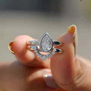 14K White Gold Plated Pear Cut 2.10 CTW D/VVS1 Moissanite Wedding Band Ring Sets - Picture 1 of 9