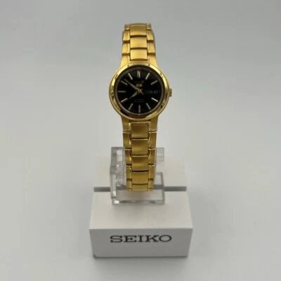 Reloj automático Seiko 5 SYME48 para mujer tono dorado acero inoxidable esfera negra Foto 1 de 4