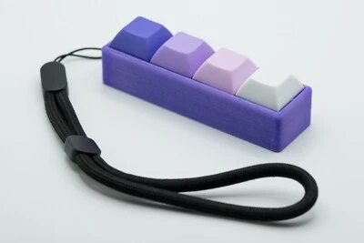 Interruptor mecánico de cuatro botones juguete inquieto con llavero Foto 1 de 4