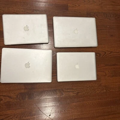 LOT OF 4 ASSORTED MACBOOK PRO LAPTOPS *FOR PARTS* - Image 1 of 4