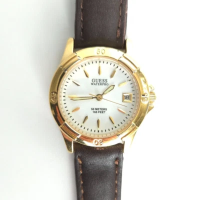 Винтажные женские кварцевые аналоговые круглые кожаные часы 90-х Guess Waterpro 50 м WR 30 мм - Изображение 1 из 4
