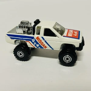 Hot Wheels Nissan Hardbody 4x4 1987 Blanco Hecho en Malasia Excelente Estado - Imagen 1 de 5