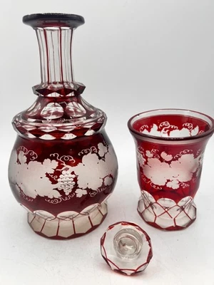 Antique Bohemian ruby red glass decanter etched grape and leaf design with cup - Image 1 of 4