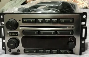2006 HUMMER H3 3.7L FRONT CENTER DASHBOARD DASH PANEL AM FM RADIO NAVIGATION OEM - Picture 1 of 5