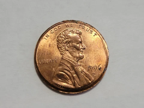 1996 D Lincoln Memorial Penny Coin Strike Error Obverse Bent Cover