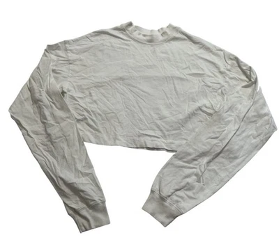 Top corto de manga larga ALO Yoga en blanco Foto 1 de 3