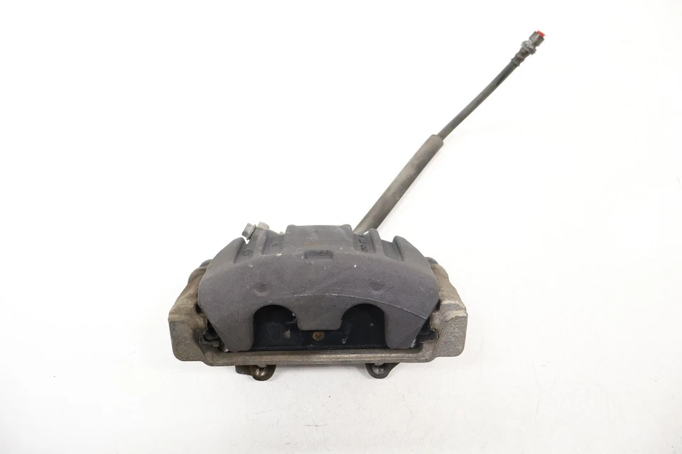 PINZA DE FRENO DE DISCO DELANTERA IZQUIERDA CHRYSLER 300 2011-2023 OEM 68243631AG Foto 1 de 4