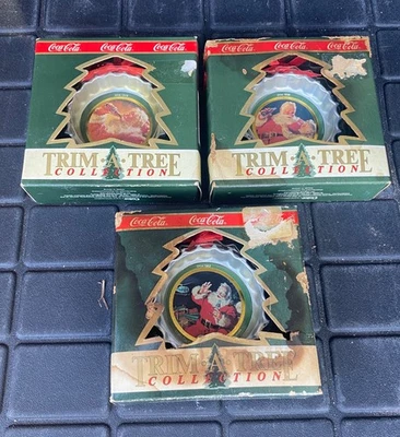 VINTAGE SET OF 3 COCA COLA TRIM A TREE COLLECTION CHRISTMAS ORNAMENTS IN BOXES - Image 1 of 4