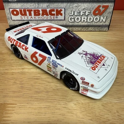 Vintage Action 1:24 Jeff Gordon #67 Outback Steakhouse 1990 Pontiac 1:24 Diecast - Image 1 of 4