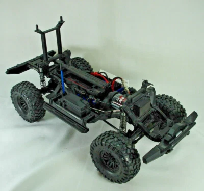 TRAXXAS TRX4 1/10 RC 4X4 COMPLETE TITAN 21+ MOTOR RECEIVER/TRANS - NEW* - Imagen 1 de 4