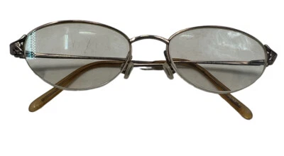 Conceptos de marco de gafas ovaladas de medio borde dorado vintage Nino Balli en óptica Foto 1 de 4