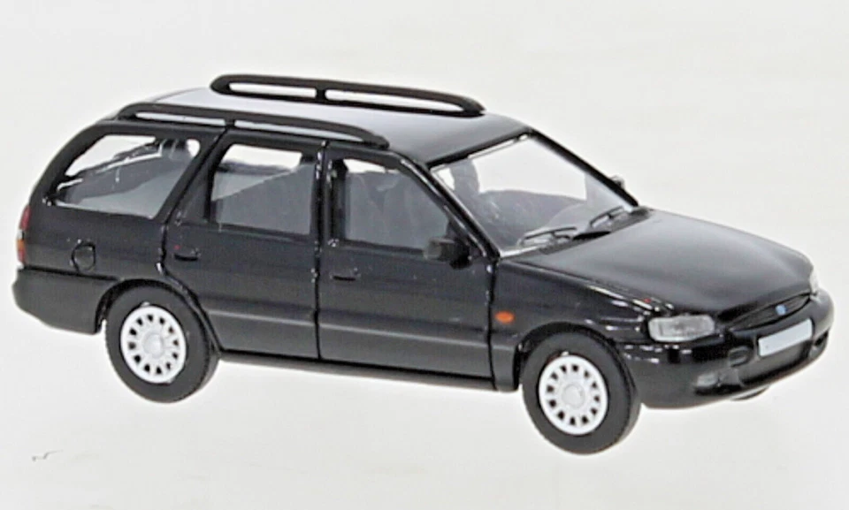 Brekina PCX870464 Ford Escort MK VII Station Wagon Nero, 1995, H0, Nuovo 2023 - Immagine 1 di 1