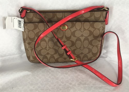 Nuova borsa Coach Khaki & Persimmon Peyton Signature East West Swingpack 51065 RARA