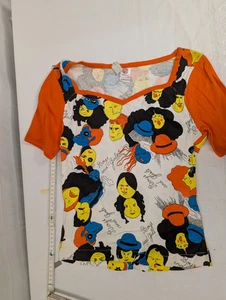 Camisetas.   Proverbios años 80. Rostros de niño y niña y un gráfico - Imagen 1 de 3