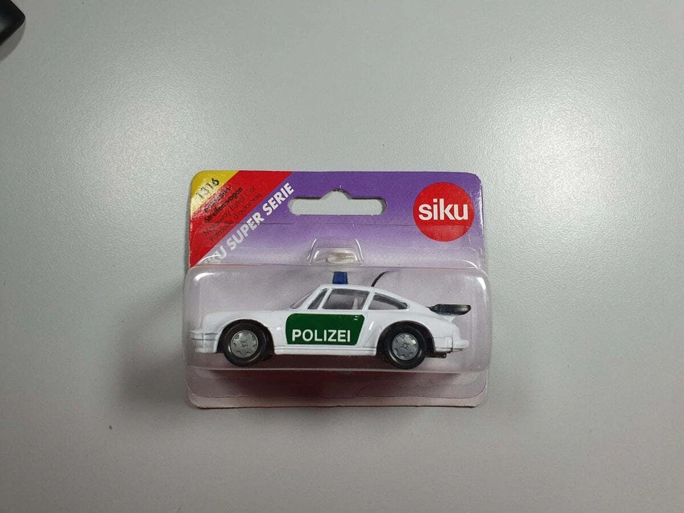Porsche 911 Turbo Polizei N1316 Siku 1/66 Con Scatola - Immagine 1 di 1