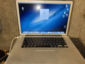 Works 2009 Apple MacBook Pro 15" i7 2.66GHz 2GB RAM - Picture 1 of 8