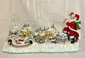 Thomas Kinkade "Santa's Inspiration" Illuminated Moving Musical Wonderland - Picture 1 of 9