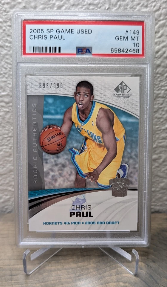 CHRIS PAUL RC PSA 10 GEM MINT 2005 SP Game Used #149 SN /999 Rookie Card - Image 1 of 2