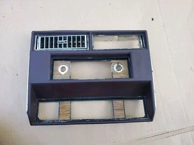 Cadillac Fleetwood Brougham 1980-1985 tracción trasera radio bisel placa frontal Foto 1 de 4