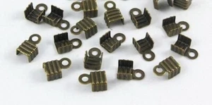 100 antike Messing 4x6 mm U-Form gewellte Überschlagschnurenden - Bild 1 von 2