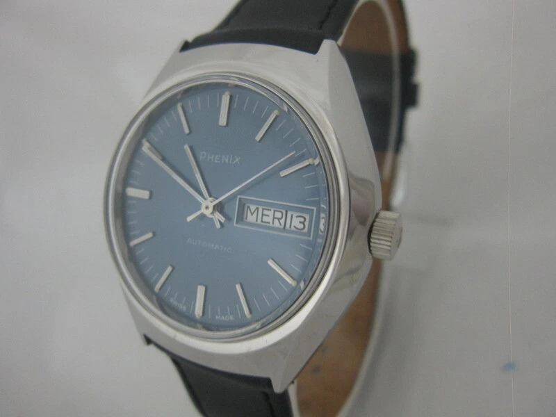 NOS NEW SWISS AUTOMATIC SHOCK RESIST MENS PHENIX ANALOG WATCH WITH DAY AND DATE - Image 1 of 4