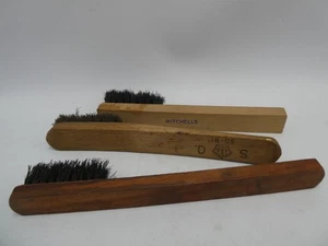 3 ANTIQUE WOODEN HANDLE BRUSHES - MITCHELLS - BROAD ARROW ARMY - & CROWN STAMP - Picture 1 of 9