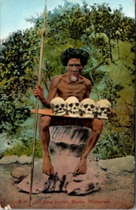 MANILA, PHILIPPINES - OLD HEAD HUNTER & HIS SKULLS - ETHNIC - OLD POSTCARD - Picture 1 of 2