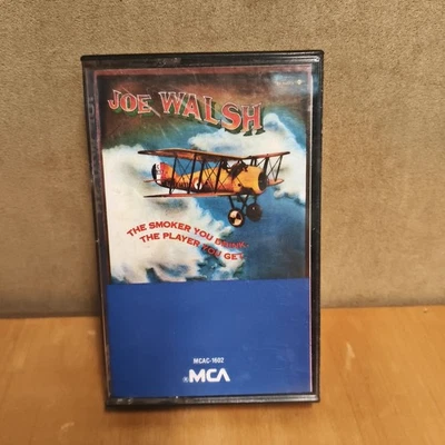 Joe Walsh The Smoker You Drink, The Player You Get - Cassette Tape Album Foto 1 de 4