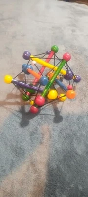 Manhattan Toy Co SKWISH Bebé Desarrollo Sonajero Madera Sensorial Colorido Foto 1 de 2