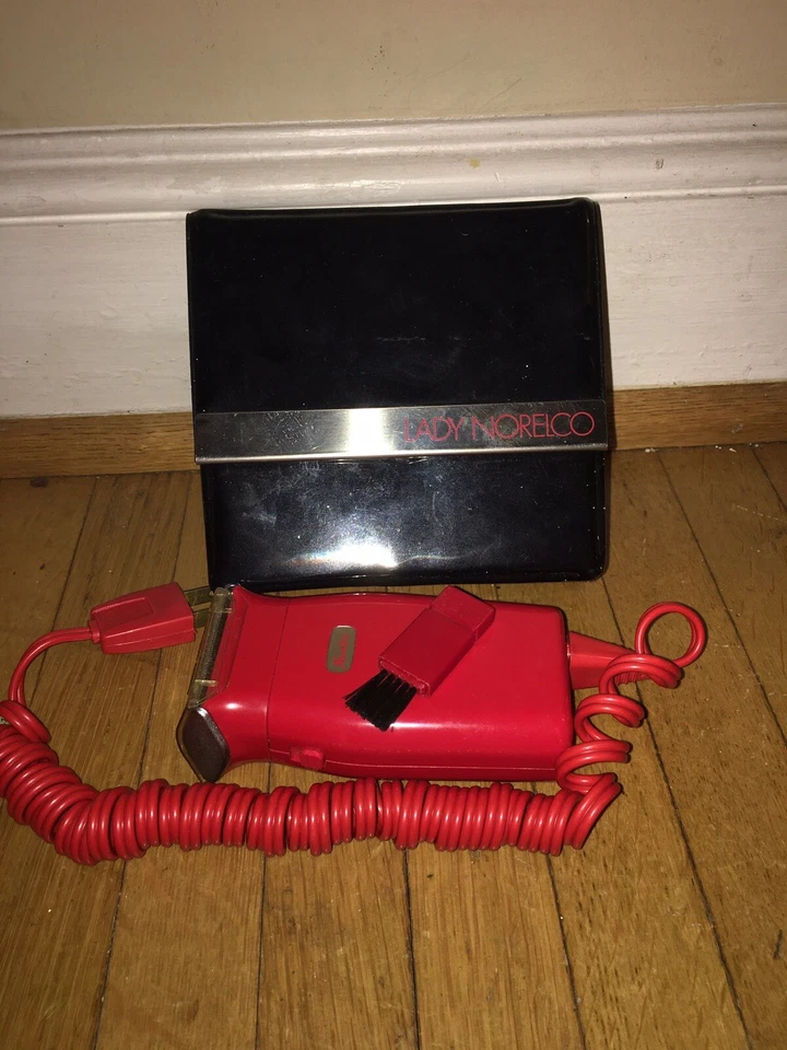 Afeitadora Norelco Vintage Roja Dama Doble Voltaje Viaje Estuche Negro Funciona Foto 1 de 4