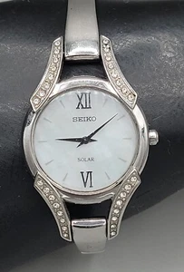 Seiko Solar Swarovski Crystal Ladies Watch 28mm MOP Dial 7" Silver Tone V1150AZ0 - Picture 1 of 24