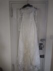 White wedding dress size 4, runs small. Long sleeves, A-line. Custom made. W