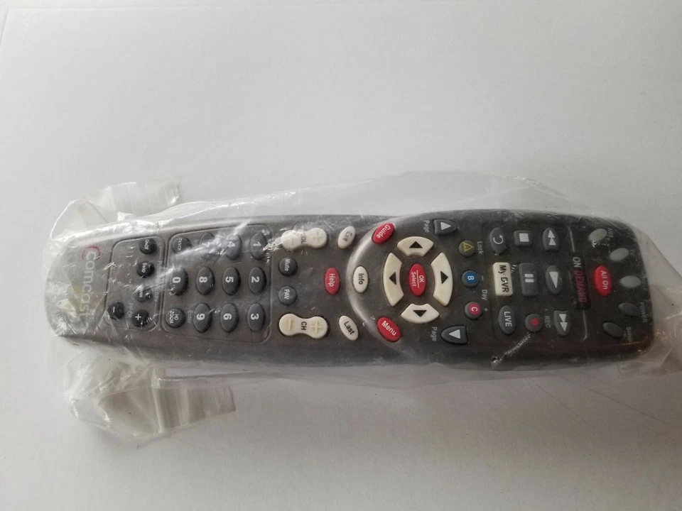 Comcost  remote control universal with user guide new. - Image 1 of 4
