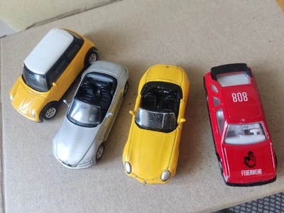 Juego 4 coches Welly Mini Cooper BMW Z3 Roadster BMW Z8 Ford Sierra XR4i Fuerwehr 808 Foto 1 de 4