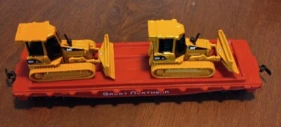 HO scale vintage Great Northern flat car with two CAT D5G XL Track Type Tractors - Image 1 of 4