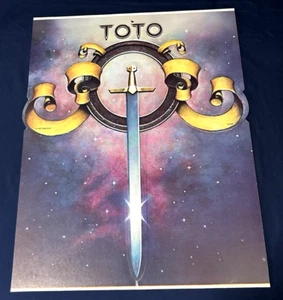 🔥MUY RARO Toto debut en tienda PROMO pantalla de 2 caras 22x17 stock grueso sin usar - Imagen 1 de 9