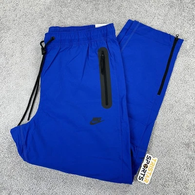 Calça Nike Tech Tecido Masculina Grande Azul Ajuste Padrão Perna Cônica Joggers HM8241-480 - Imagem 1 de 4