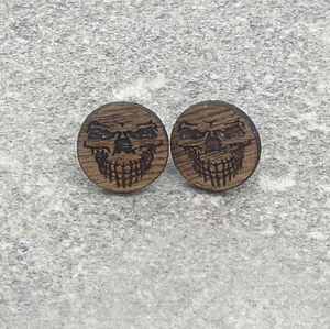 Ghoulish Skull Face Stud Earring on Walnut - Picture 1 of 3