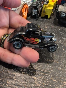Hot Wheels Real Riders Hi-Rakers 3-Window '34 Ford Coupe schwarz mit Flammen gut  - Bild 1 von 6